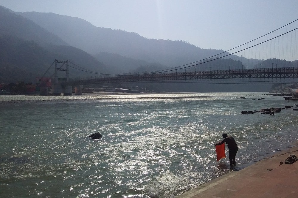 Morning Bathing at Swaminarayan Ghat Rishikesh India