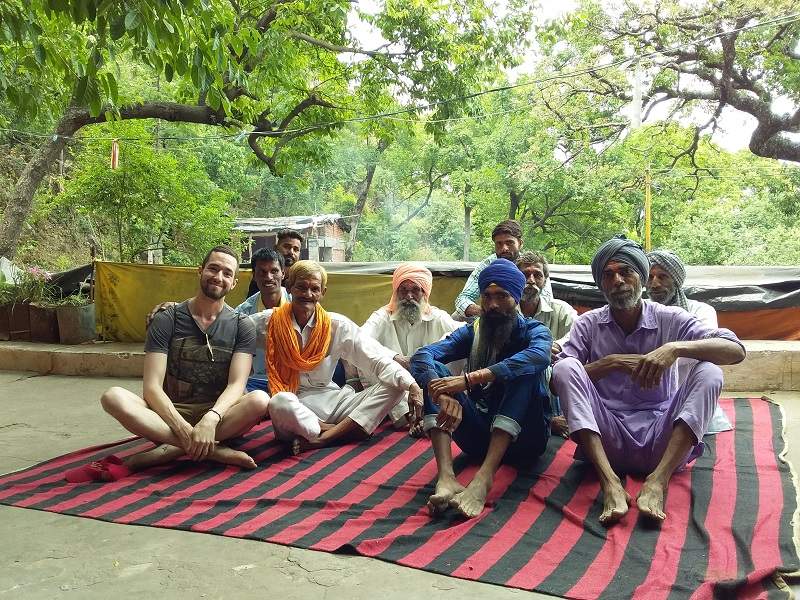 a tourist with visitors at Jhilmil cave rishikesh