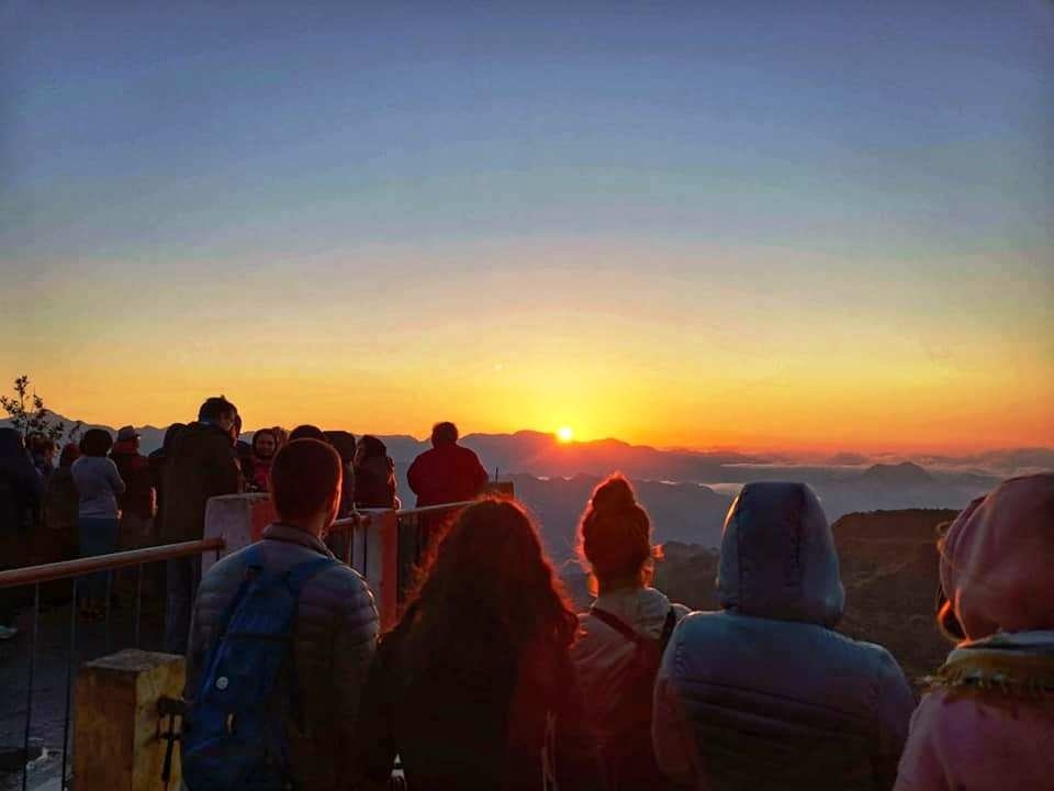 Sunrise over the Himalayan mountain ranges from Kunjapuri viewpoint near Rishikesh